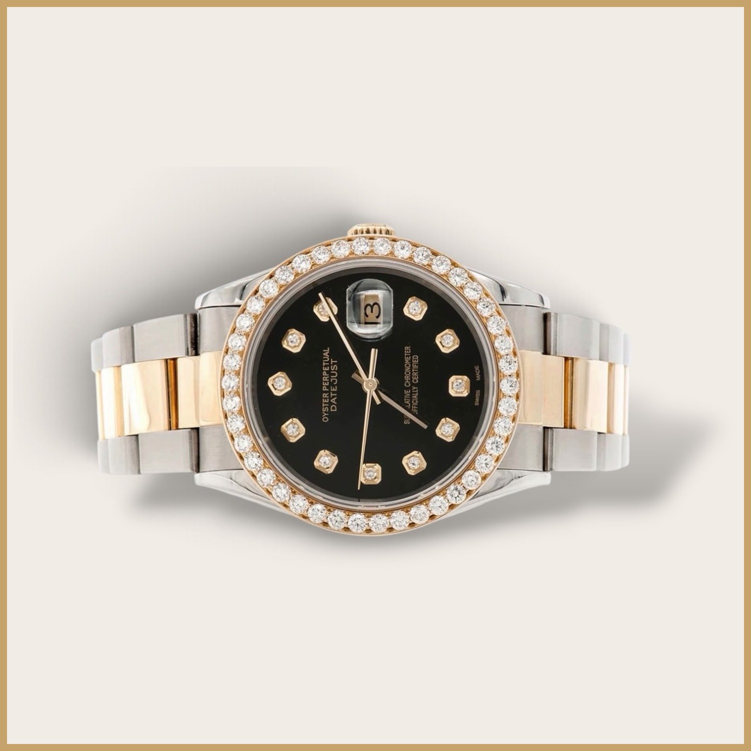 Two-tone Datejust watch with a black dial and a diamond bezel