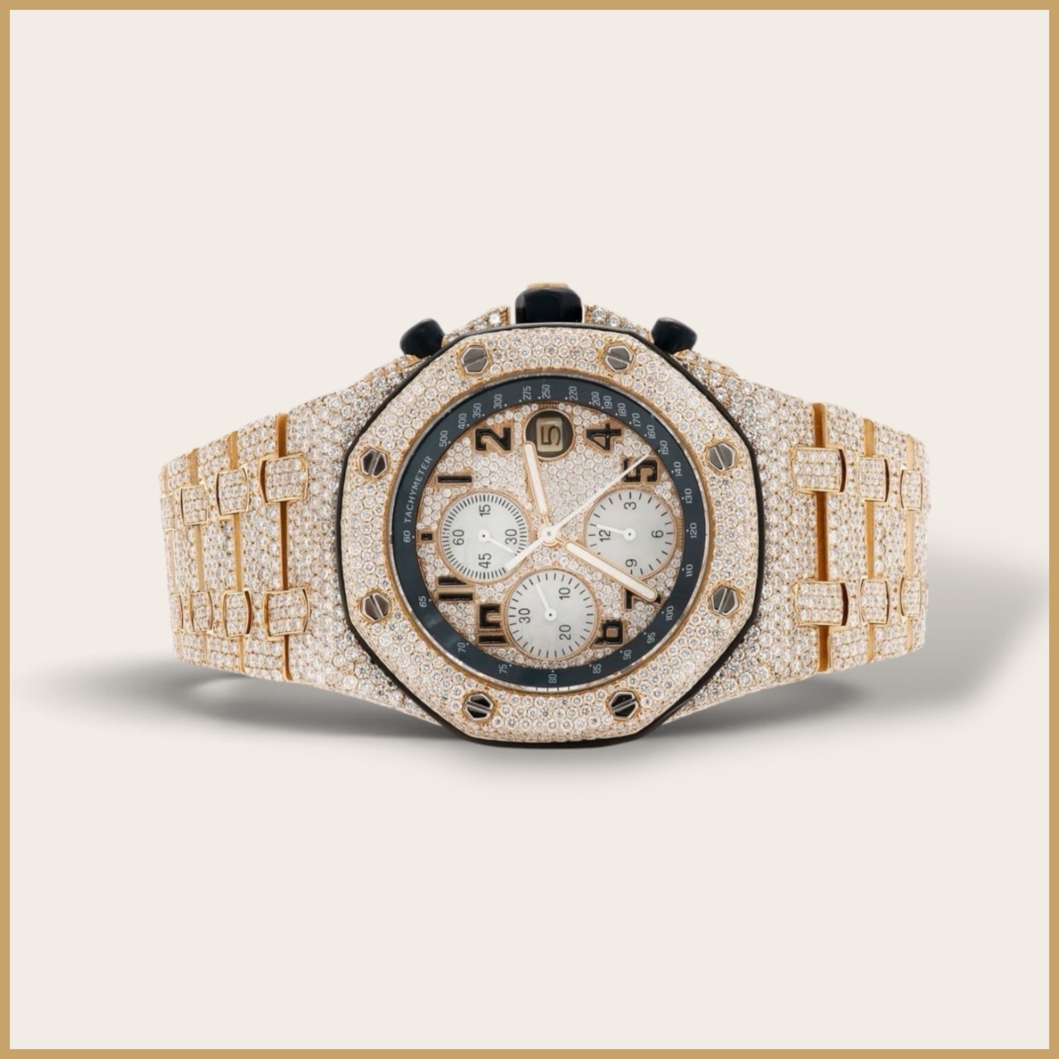 Gold tone chronograph with a pavé case and bracelet