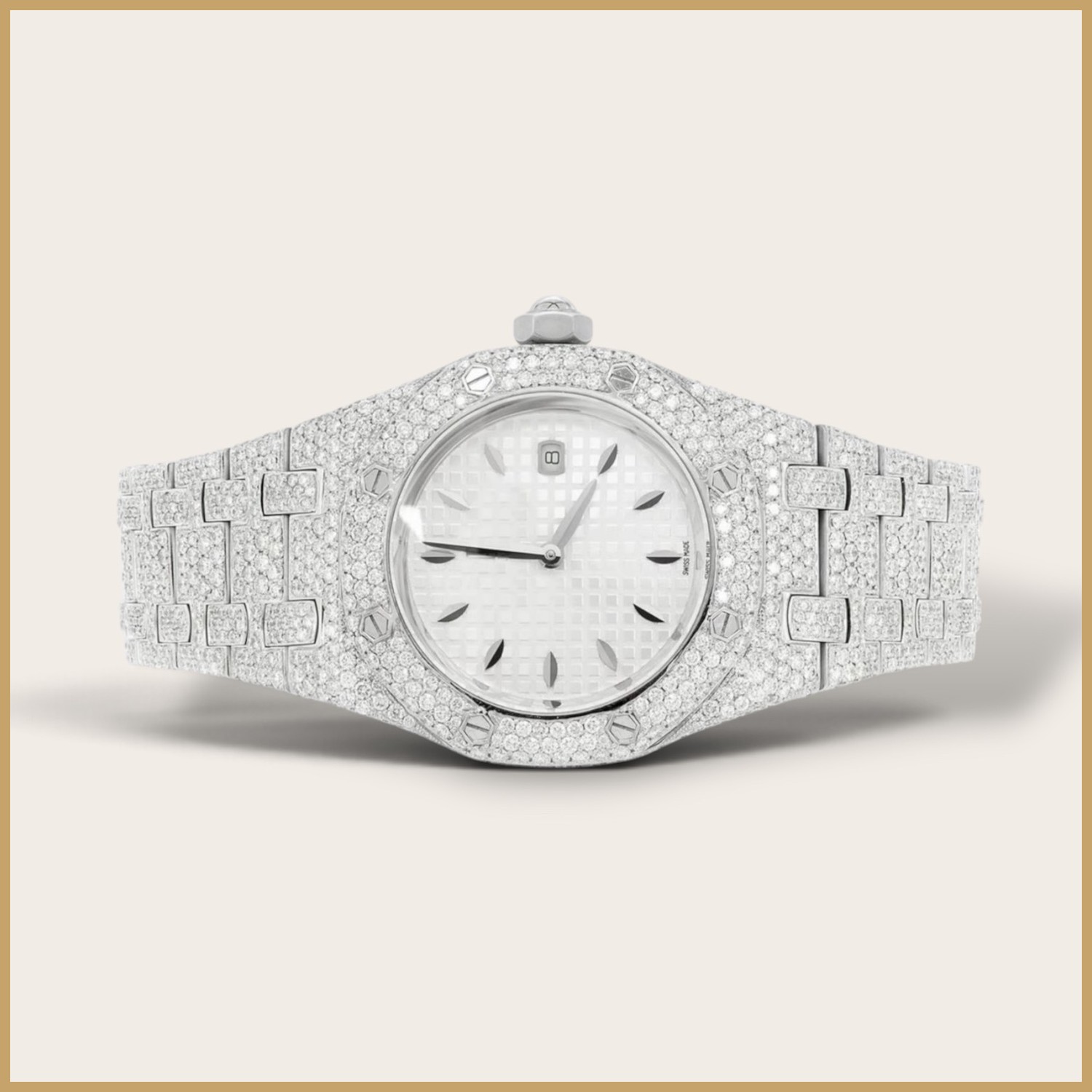Silver octagon watch with a white dial and a pavé bracelet