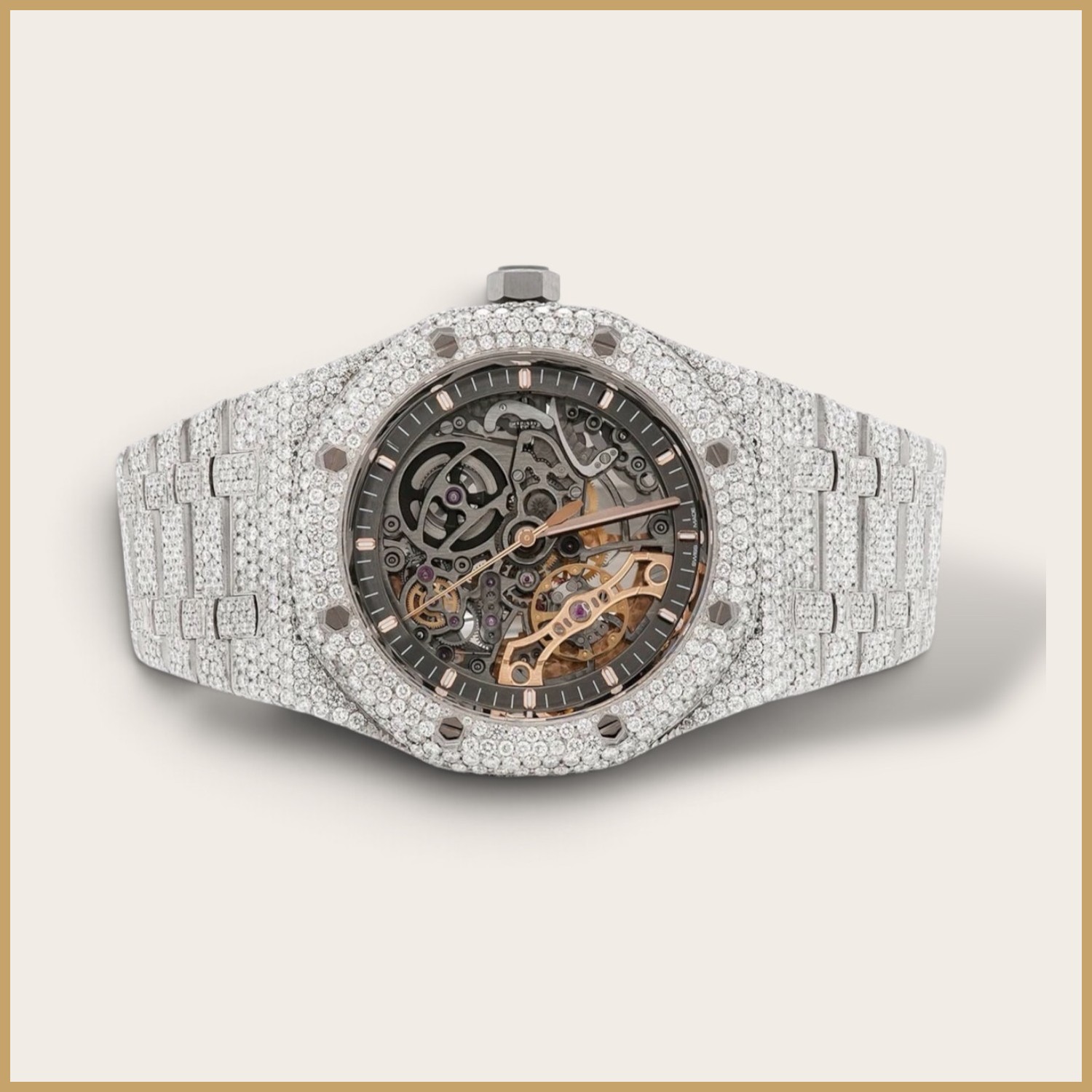 Silver skeleton watch with a pavé bezel