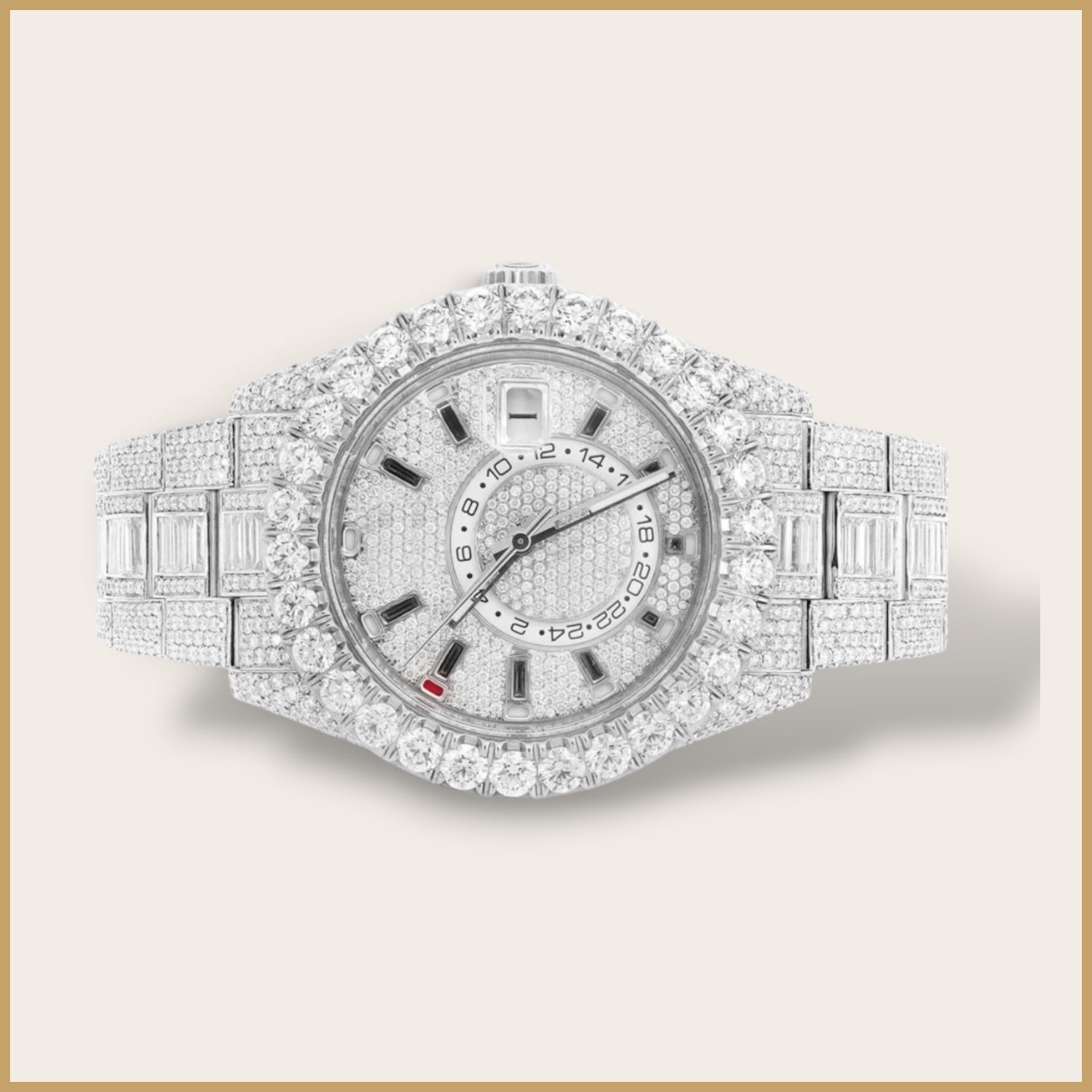 Silver watch with a 24-hour ring on the dial and a baguette bracelet
