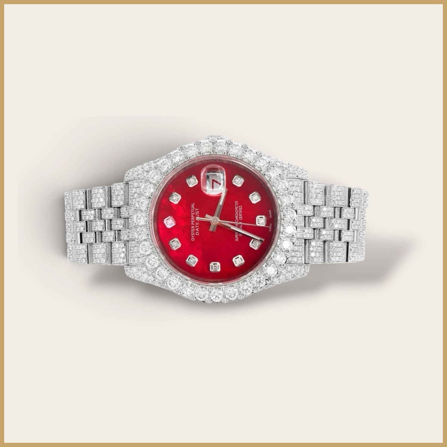 Silver Datejust watch with a red dial and a fully set bracelet