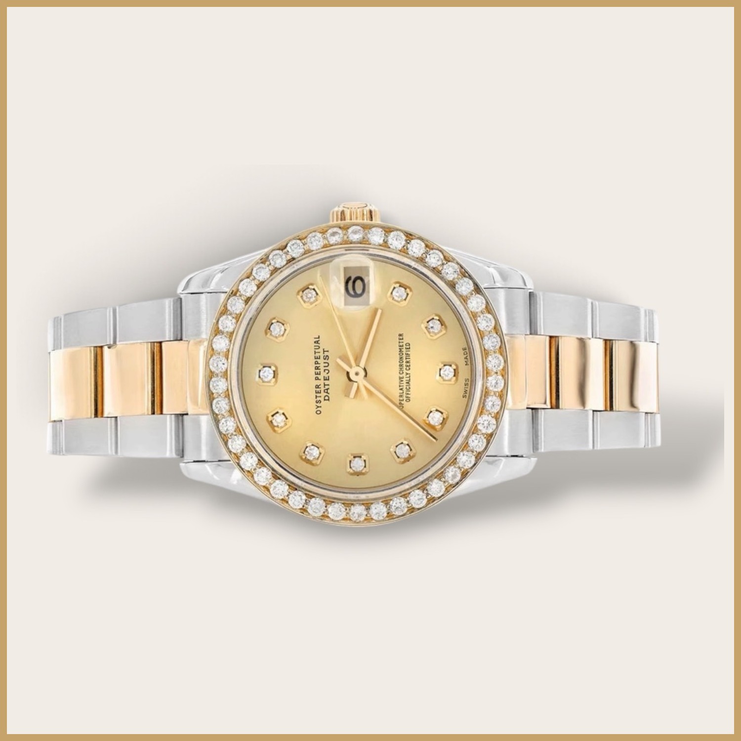 Two-tone Datejust watch with a champagne dial and a diamond bezel