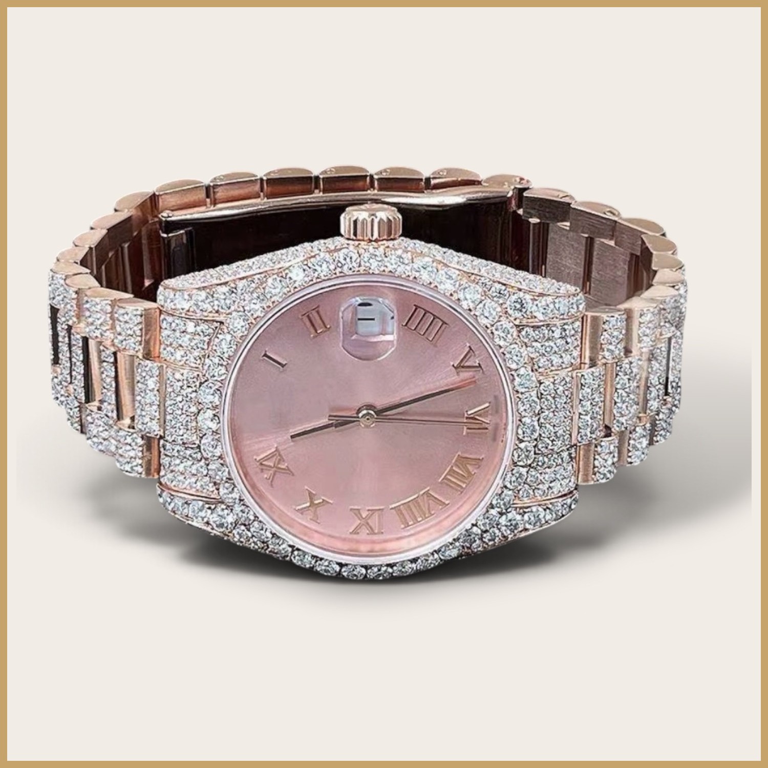 Rose gold tone watch with a pink dial and Roman numerals