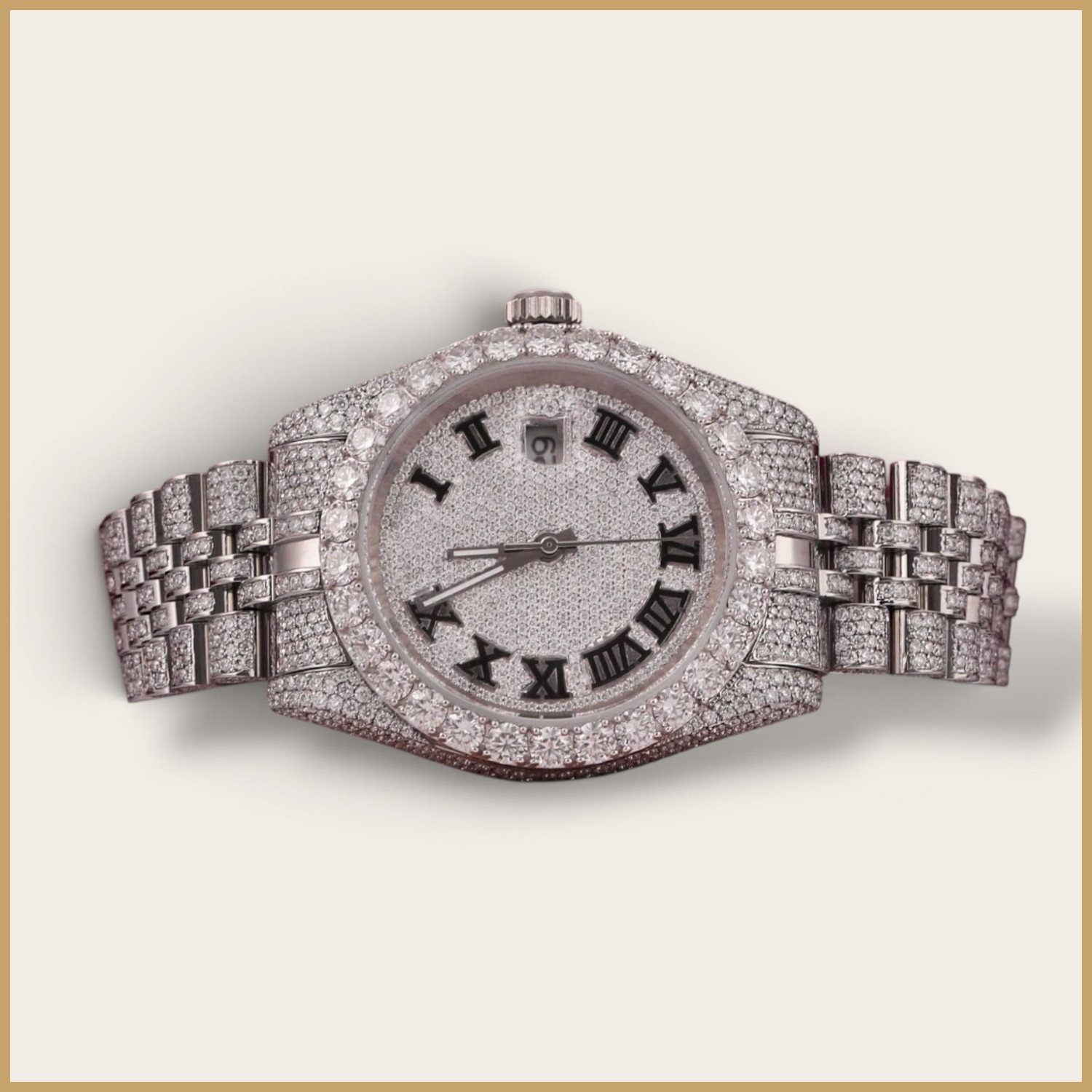 Silver watch with Roman numerals on a pavé dial