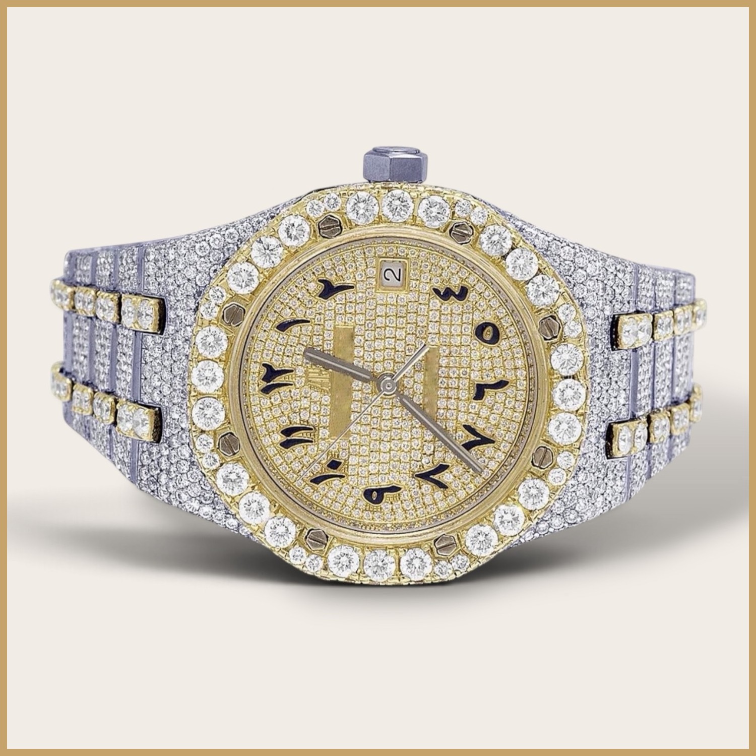 Two-tone watch with a gold pavé dial and Arabic numerals