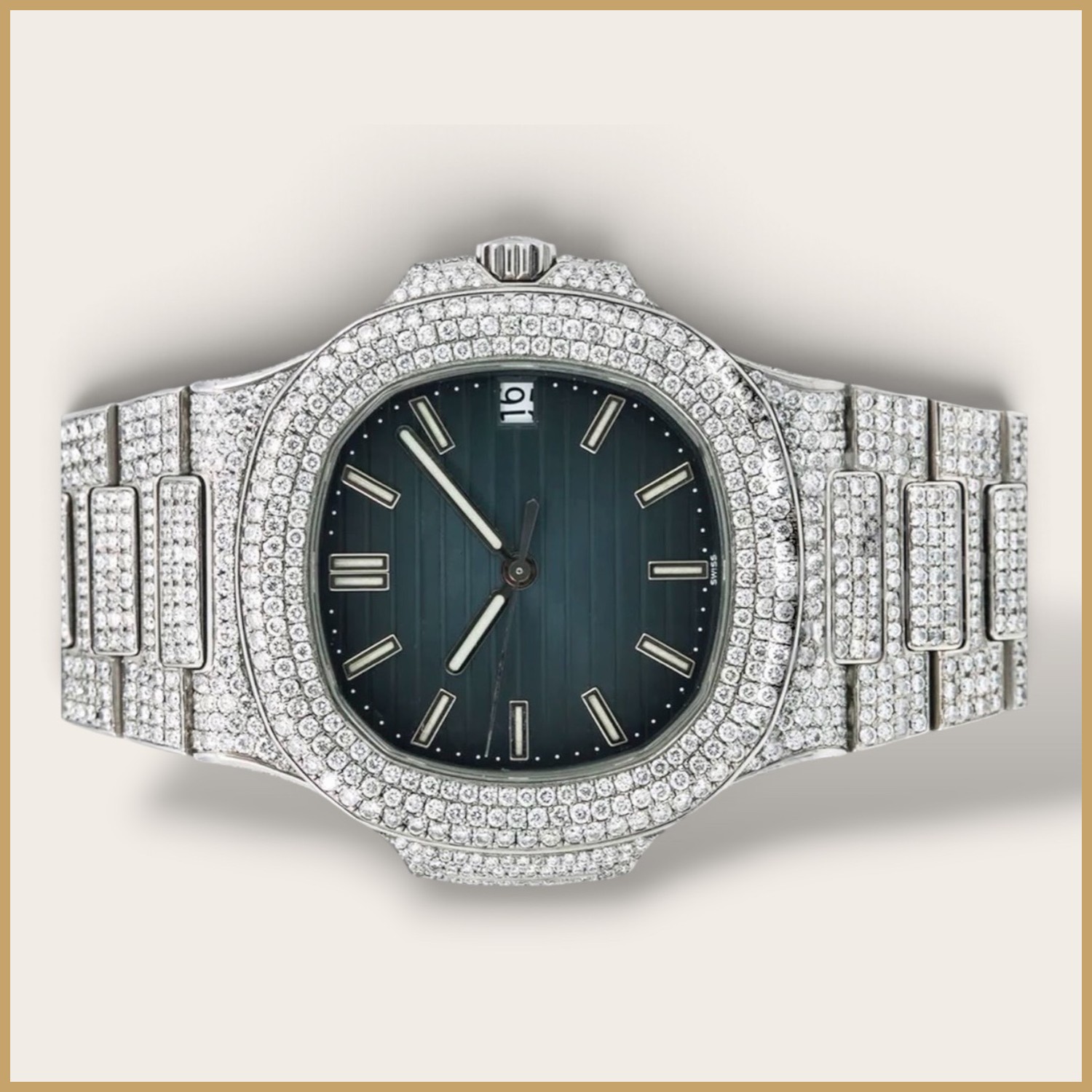 Silver watch with a dark green dial
