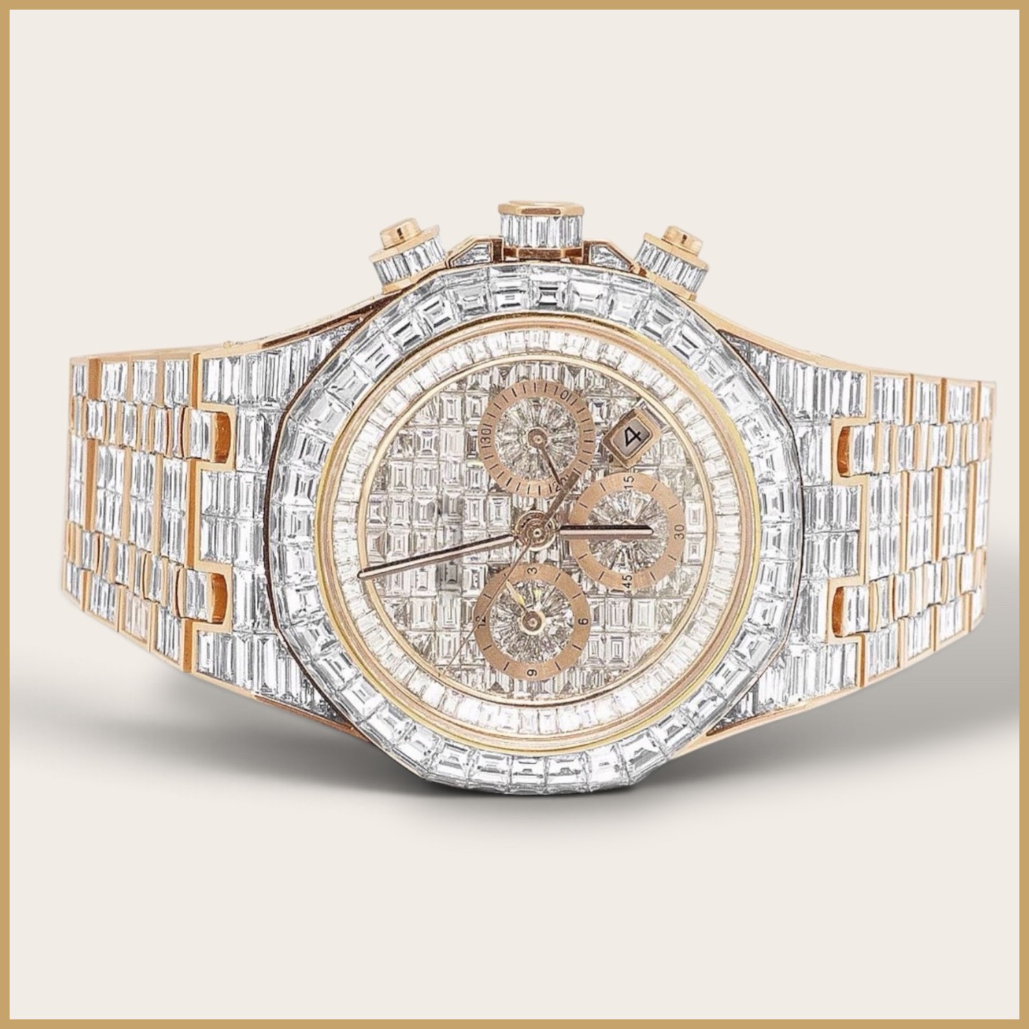 Rose gold tone chronograph with a baguette bezel