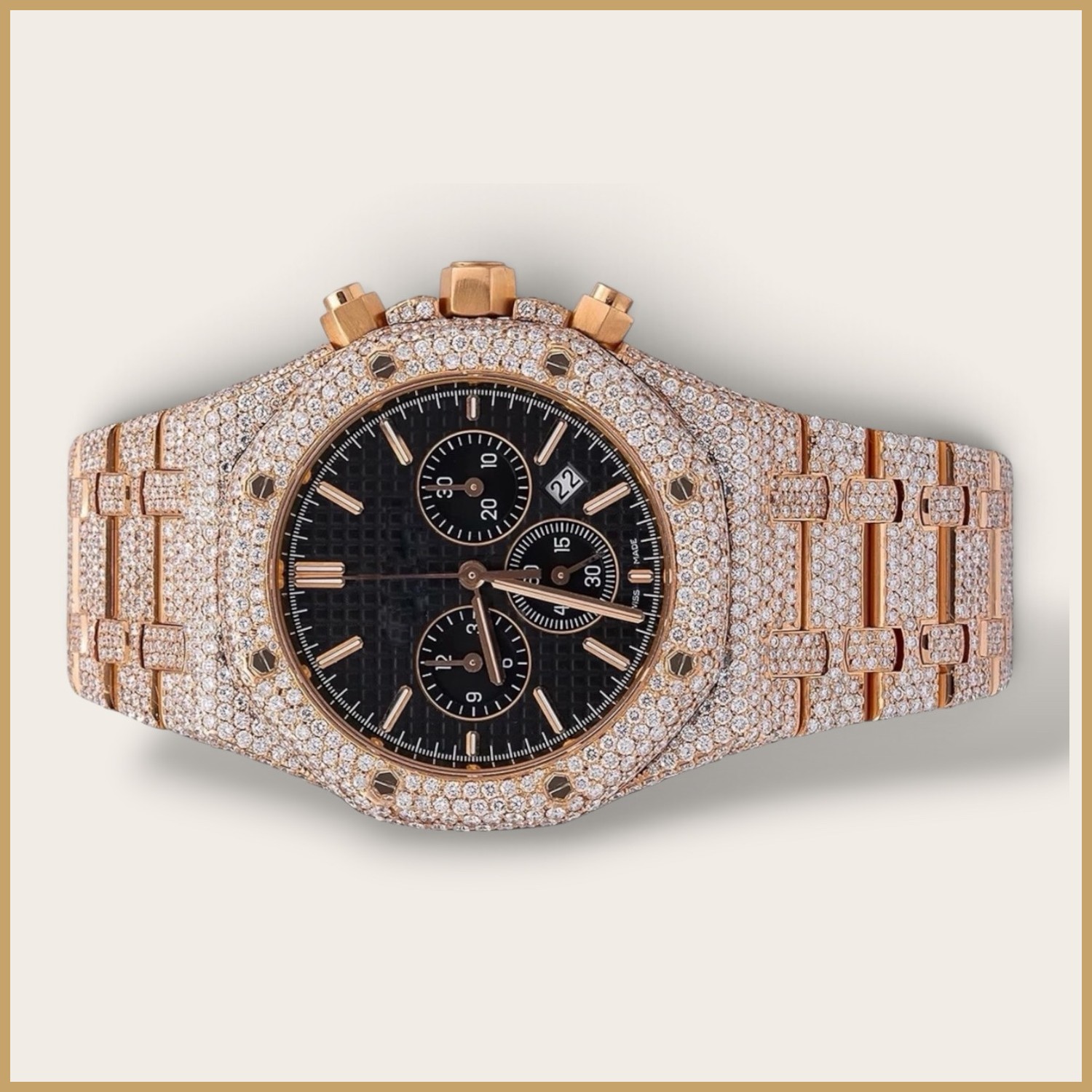 Rose gold tone chronograph with a black dial