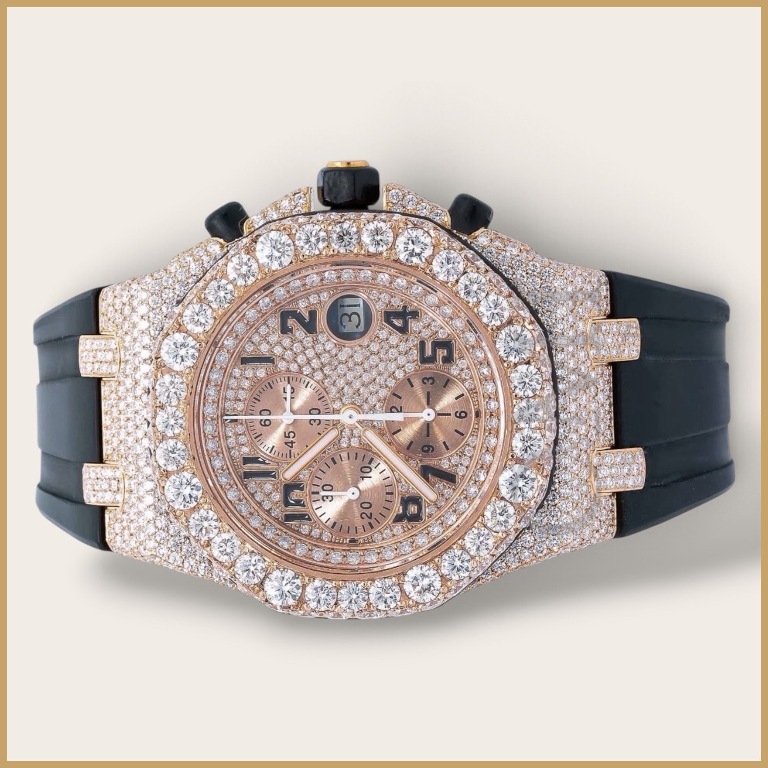Rose gold tone chronograph on a black rubber strap