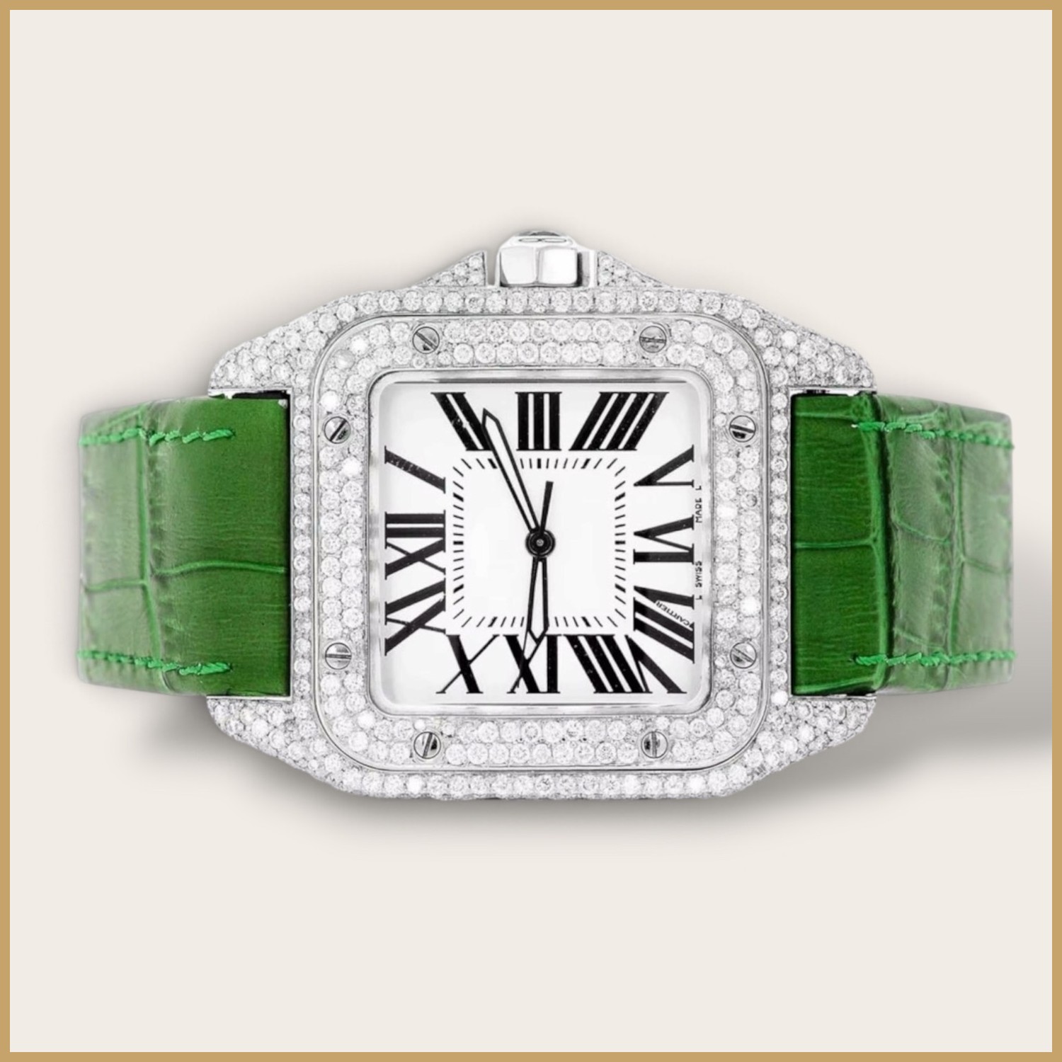 Silver square watch on a green strap with Roman numerals